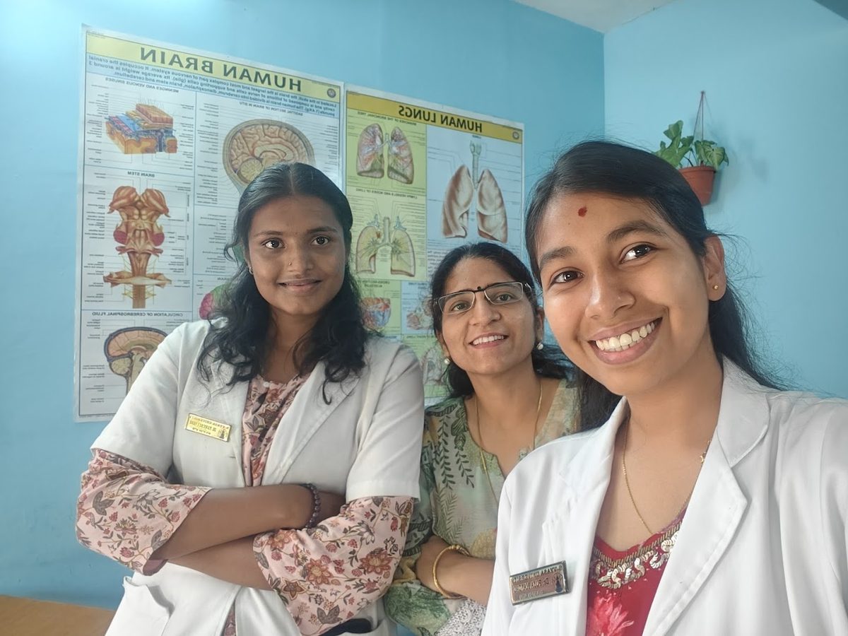 Dr. Kaushal with students in the anatomy lab